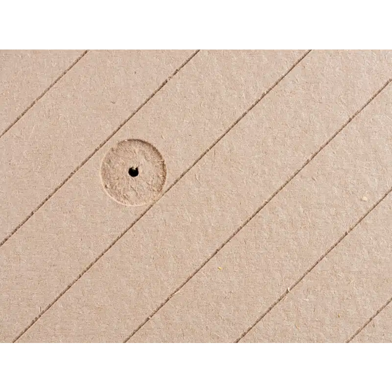 This shows the surface of the UdiRECO boards with the fixing holes pre-countersunk so that the fixings end up perfectly flush with the surface once installed.