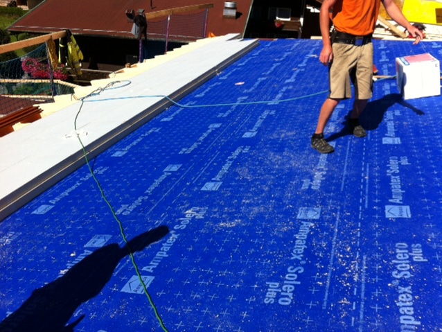 Material in action.

This image shows the Ampatex Solero membrane being used on top of a warm deck. It’s robust nature means it’s a great membrane to use in this location as it isn’t going to be easily torn by items touching the surface during the installation of the insulation.